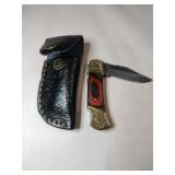 Gold/ brown pocket knife w/ case
