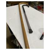 One wood came one metal telescoping cane