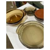 Three small Lï¿½ovenware casserole, dishes, one pie