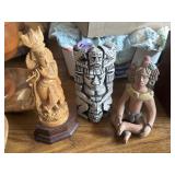 Carved sculptures, one signed 1994, another