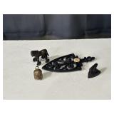 Cast iron trivet, miniatures, and brass bell