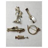 Gold tone brooches horn, shoe, phone