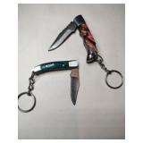 2 green and brown handled pocket knife keychains