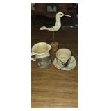Wooden bird figurine and hand made pottery