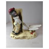 Modern cast iron boy with duck