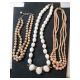 2 beaded choker necklaces 1 white beaded necklace