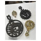 Brass and cast-iron trivets