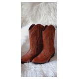 Lei. Name brand leather cowboy boots, super nice