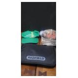 2 baseball hats and a magazine holder redfield