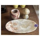 Carved marble figures and small plate