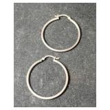 Silver hoop earrings marked 925.   .115oz