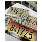 2 Indiana license plates and 2 Florida license