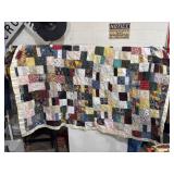 80' hand-stitched quilt w/ a patchwork design