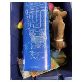 Tote with plush toys, poster, comic book, and