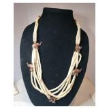 Vintage six strand white beaded necklace copper