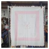Hand made baby quilt with embroidery and triangle