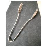 Silver tongs Marked Sterling 2.495oz