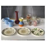 Variety of souvenir glasses, vases, decorative