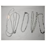 2 silver tone necklaces and  1 matching bracelet