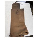 Left WWII U.S. Horse Cavalry gas mask leather
