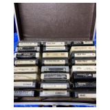 Collection of 24  8-tracks in storage case,