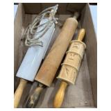 3 rolling pins and a trivet