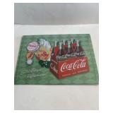 12 in x 17 in metal Coca-Cola sign