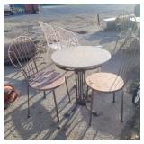 2 seater metal/stone table and 2 chairs table