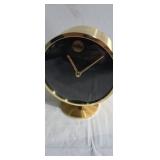 Brass pedestal clock unmarked has small golden