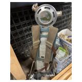 Early scuba tank with lead weight belt, and