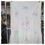 Hand made Peter rabbit baby quilt with some