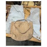 Leather chaps and leather bag