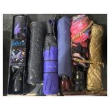 Several like new umbrellas Saks 5th avenue,