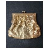 Gold tone mesh change purse