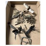 Assorted keys, spark plug airplane art, flower