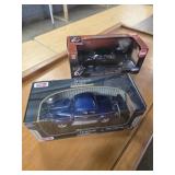 2 1:18 Die Cast Cars