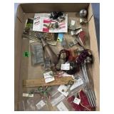 Miscellaneous whistles, postcards, old wooden