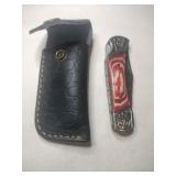 Handmade red/ tan foldable knife in case