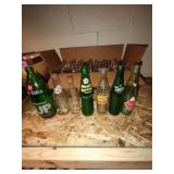 Large lot of vintage soda bottles.