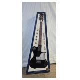 Like new First Act electric guitar in box