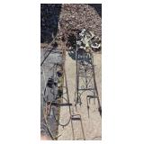 Shepard hooks and wrought iron garden decor