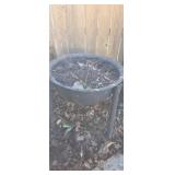 Large cast iron pot with welded stand