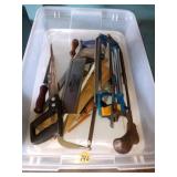 Assorted saws in tote with lid