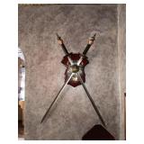 Decorative plaque with swords wall mounted