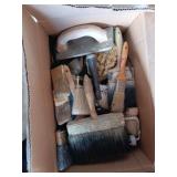 Box of paint brushes rollers and drywall tools