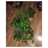 Group of three artificial floral arrangements in