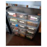 Large container with drawers items in drawers are