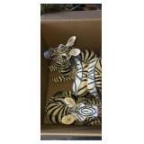 Resin zebra sculptures
