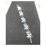 Silvertone Kramer floral blue pedals clear Stone