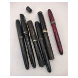 Group of broken fountain pens.  No nibs